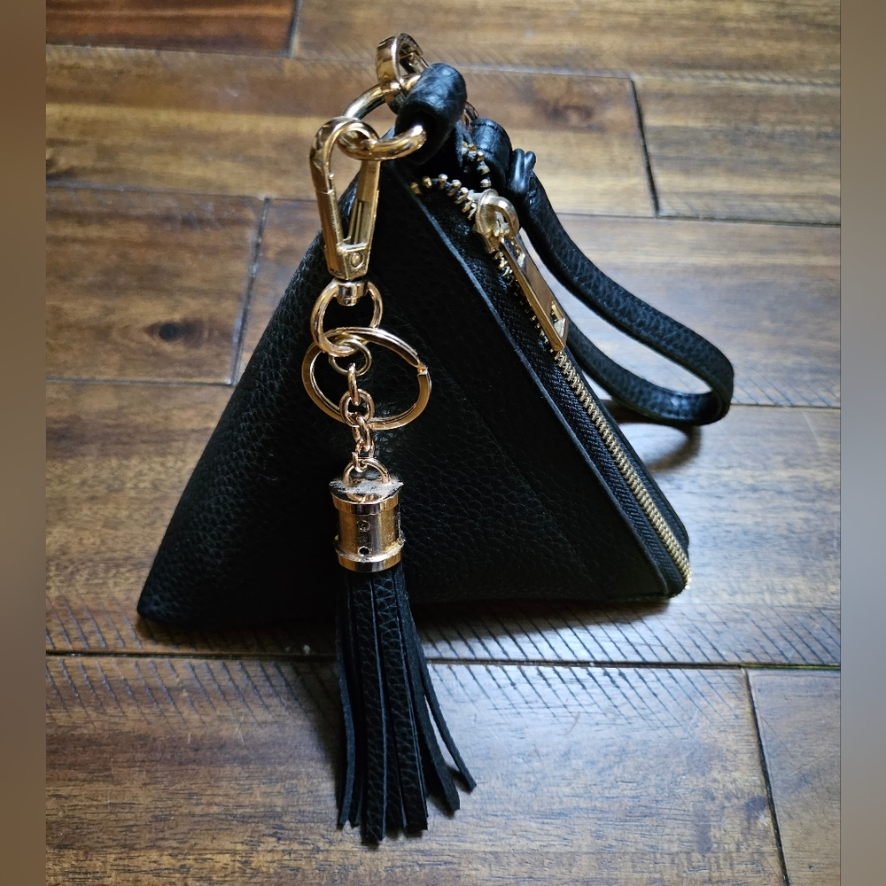 Unique triangle wristlet! 5 inches tall black and gold